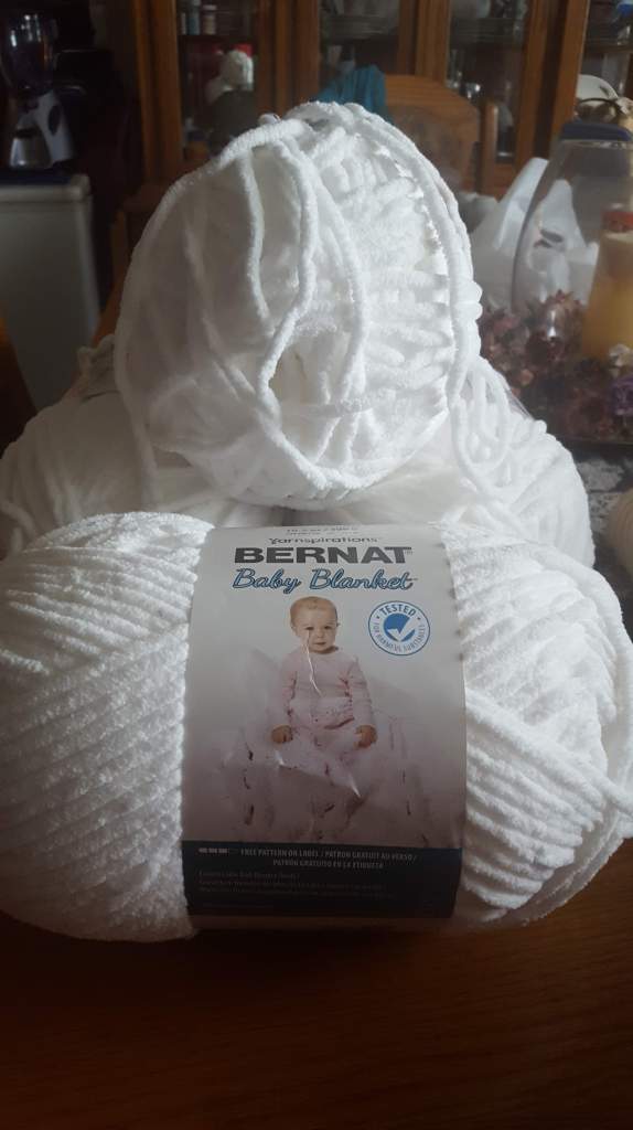 4 balls of Bernat Baby Blanket 300 gms each.